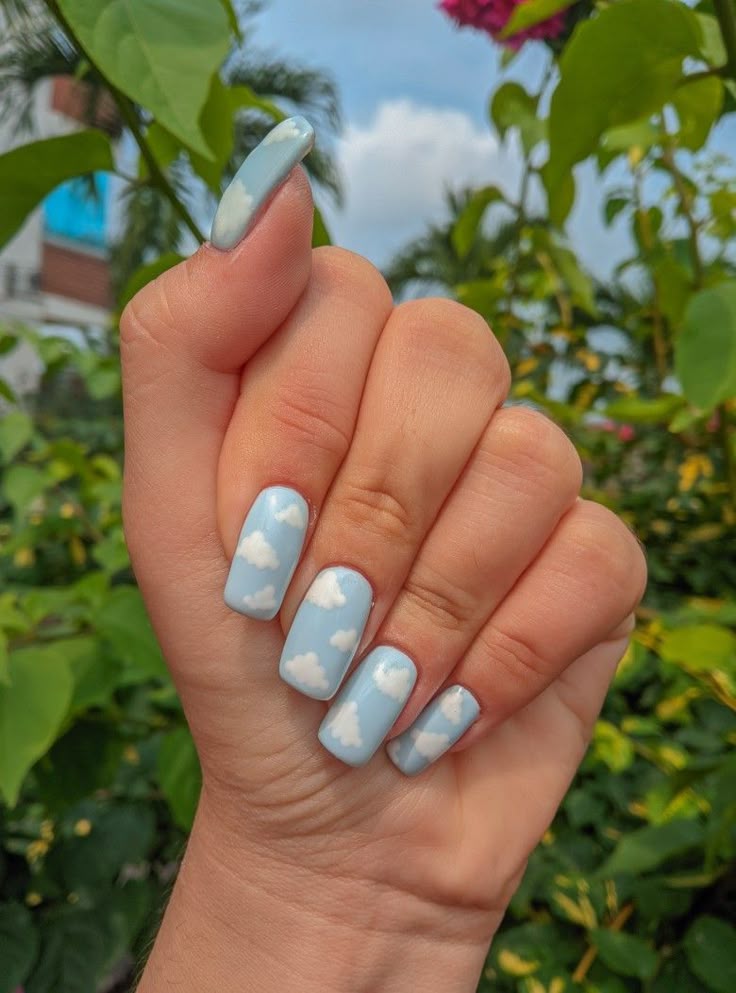 Cloudy Sky Design with Blue Tips nail
