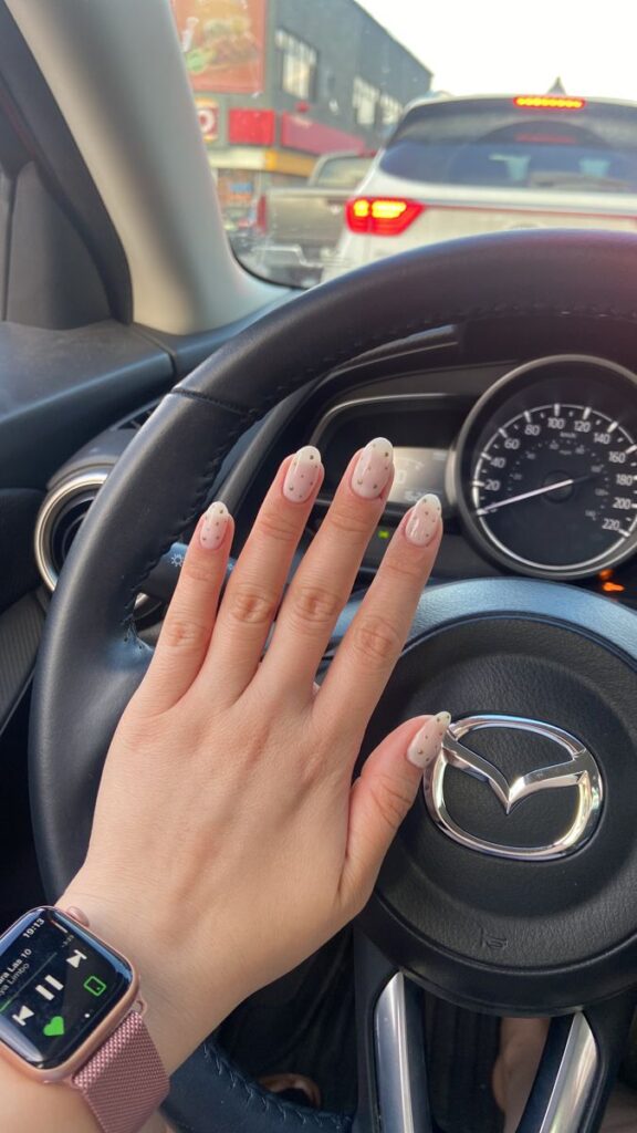 Gold Dots on White Nails