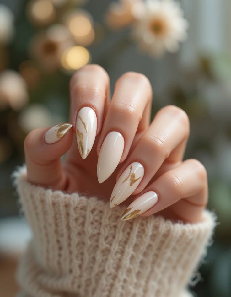 White and Gold Marble Nails