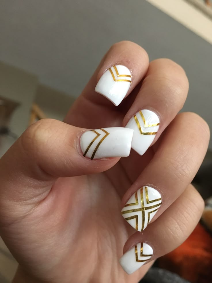 Gold Stripes on White Nails