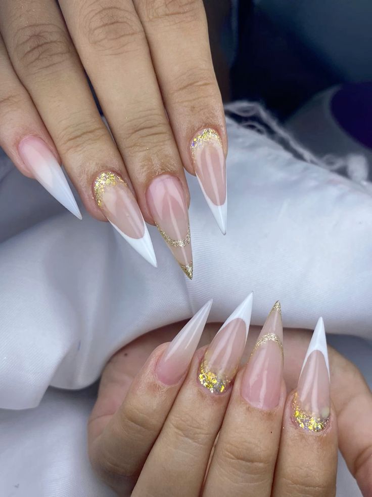 White and Gold Stiletto Nails
